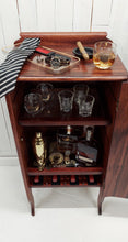 Load image into Gallery viewer, Larkin Sheet Music Mini Bar Cabinet top view open door with props
