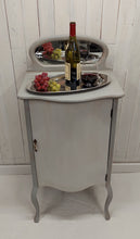 Load image into Gallery viewer, Larkin Sheet Music Wine Cabinet top front view with props
