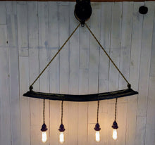 Load image into Gallery viewer, Barrel Stave with Barn Pulley Hanging Light lights on
